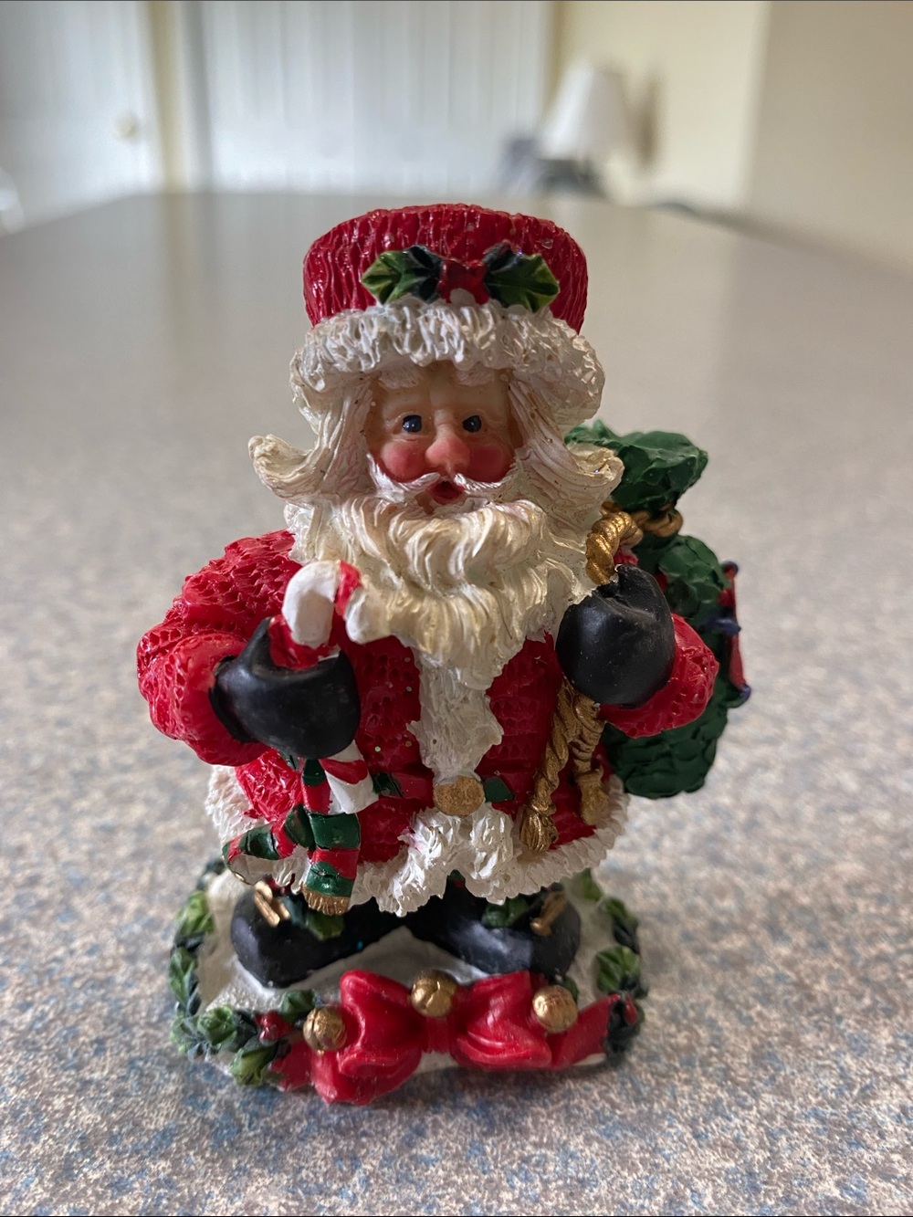 Classic Red Santa Holiday Figurine with Green Toy Sack